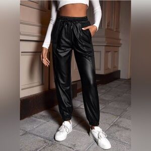 Love Tree vegan leather black drawstring jogger with 4 pockets.
